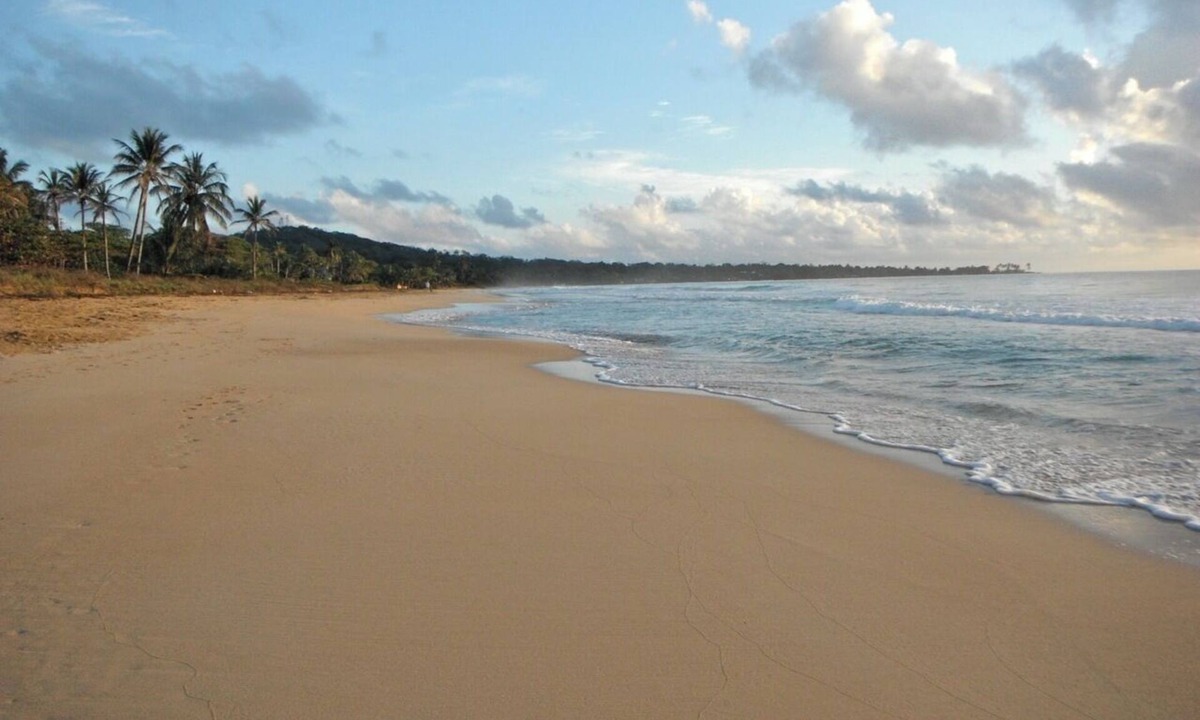 Corn Island House | 2 story home on beach, large breezy veranda for seamless indoor, outdoor living.