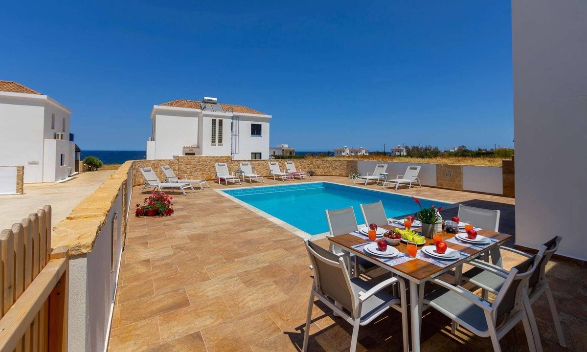 Pomos Villa | Beachfront 4 bed villa with sea views.