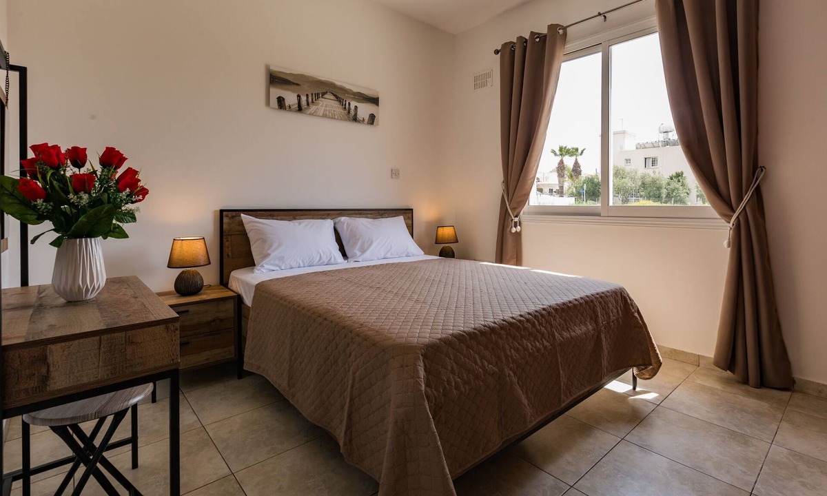 Paphos Apartment | Centrally located well established apartment with free Wi-Fi and swimming pool.