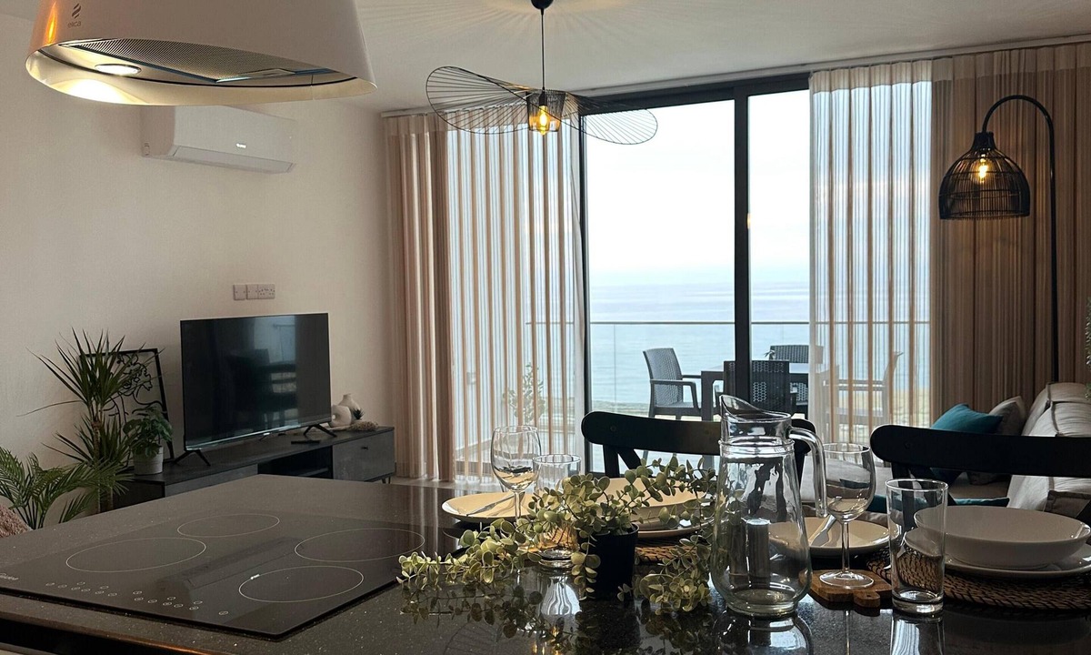 Karaagaรง Apartment | Penthouse on the waterfront with beautiful sea and mountain views. Deja Blue Wellness Resort
