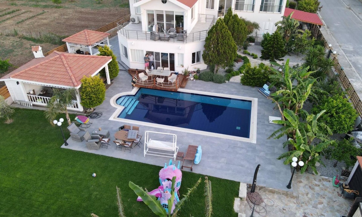Catalkoy Villa | Seafront Villa with large swimming pool with sea and mountain views.