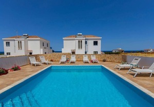 Beachfront 4 bed villa with sea views.