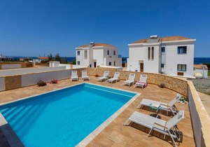 Beachfront 4 bed villa with sea views.