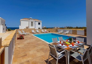 Beachfront 4 bed villa with sea views.