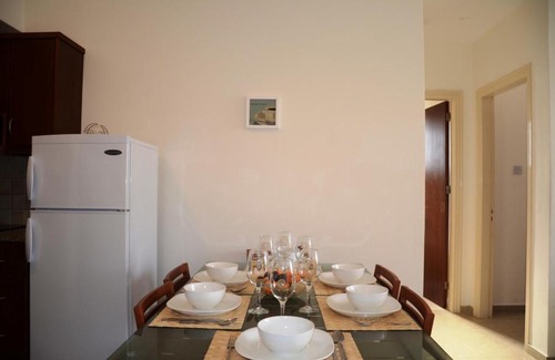 Peyia Town Apartment | 2 bedroom apartment E8 located pool level, sea view, FREE WIFI