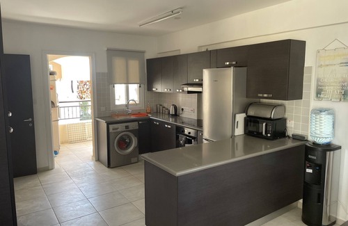Tremithousa Apartment | 2 bedroomed 2 bathroom Apartment with roof terrace. Views Over Paphos To The Sea