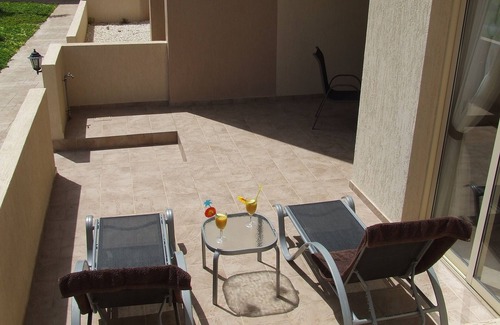 Paphos Apartment | Prime Location Ground Floor, 1 bed apartment. 2 Lagoon Pools, UK TV, FREE Wi-Fi