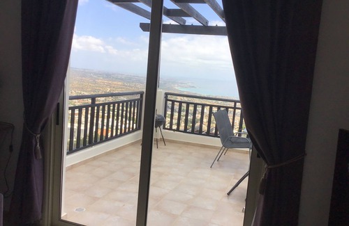 Peyia Town Apartment | Stunning panoramic sea & mountain views from south facing balcony