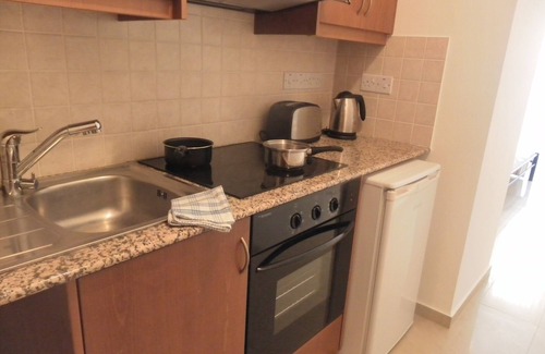 Peyia Town Apartment | Wonderful studio with double bed, kitchen & shower room, sunny balcony