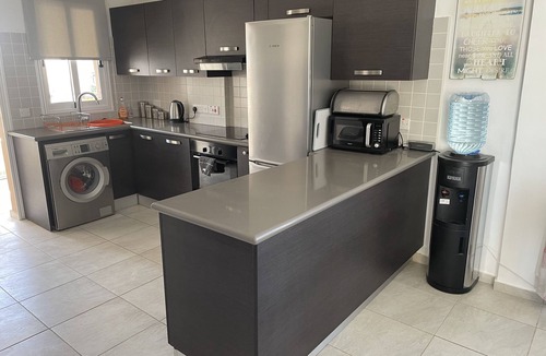 Tremithousa Apartment | 2 bedroomed 2 bathroom Apartment with roof terrace. Views Over Paphos To The Sea