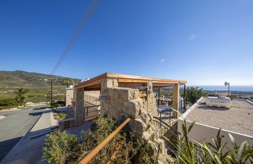 Peyia Town Villa | A stone built single storey villa that sleeps 6 guests in 3 bedrooms/amazing sea views