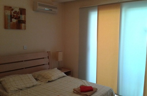 Oroklini Apartment | Adonis-Ground Floor Apartment with Secure Private Garden. Free use of car & Wifi