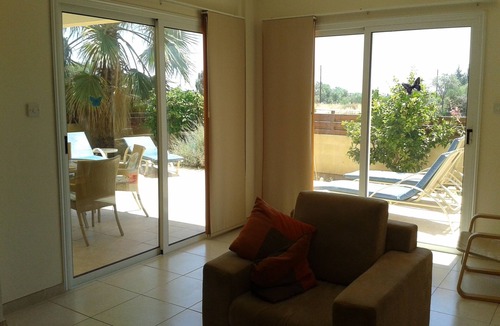 Oroklini Apartment | Adonis-Ground Floor Apartment with Secure Private Garden. Free use of car & Wifi
