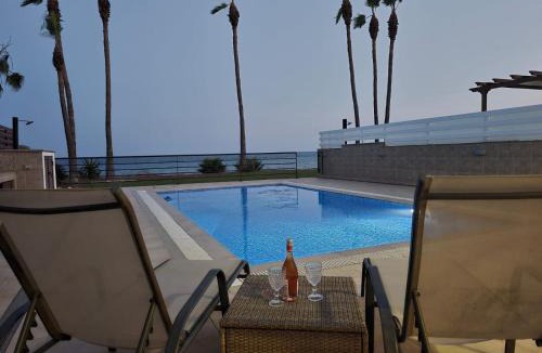 Pervolia Villa | Amazing frontline beach villa