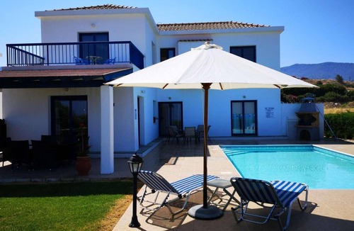 Pomos Villa | Beachfront 3 bed villa with sea views.
