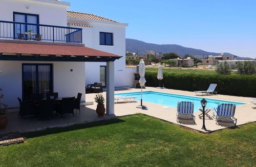 Pomos Villa | Beachfront 3 bed villa with sea views.