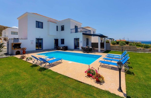 Pomos Villa | Beachfront 3 bed villa with sea views.