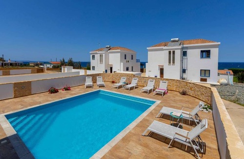 Pomos Villa | Beachfront 4 bed villa with sea views.