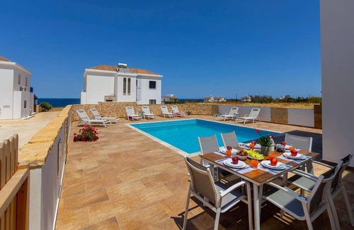 Pomos Villa | Beachfront 4 bed villa with sea views.