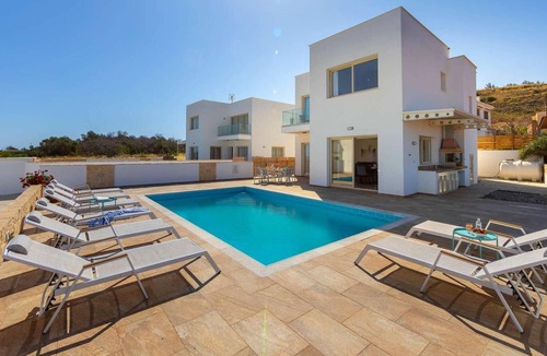 Pomos Villa | Beachfront 4 bed villa with sea views.
