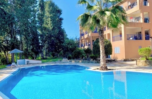 Universal Apartment | Beautifully presented 2 bedrooms apartment with a pool and garden view.
