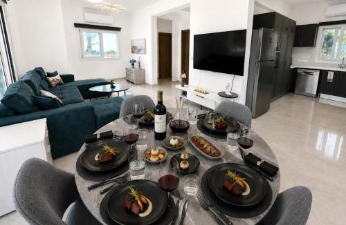 Agios Georgios Pegeias Villa | Brand New Sea-View Villa in Olive Orchard by Capt St George Resort