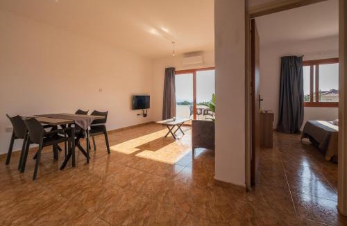 Kissonerga Apartment | Bright sea view suite with sunset & pool Paphos