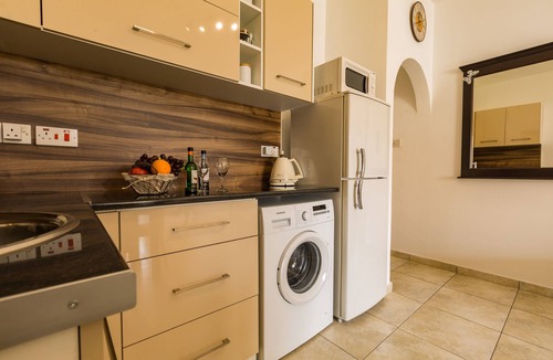 Paphos Apartment | Centrally located well established apartment with free Wi-Fi and swimming pool.