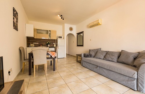 Paphos Apartment | Centrally located well established apartment with free Wi-Fi and swimming pool.