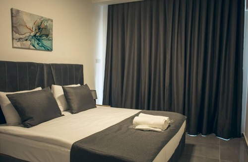 Trikomo Apartment | Charming Flat Close to the Beach with Shared Pool and Balcony with Pool View in Iskele, Cyprus