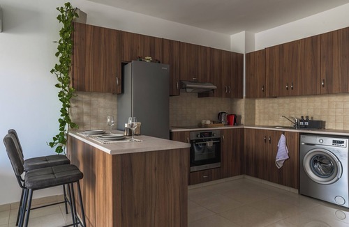 Livadia Apartment | Creative 1BR Pool View Apt with Covered Parking
