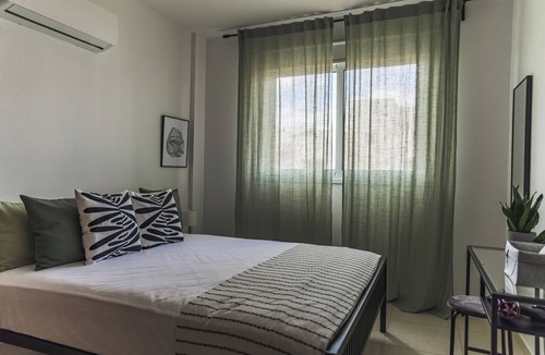 Livadia Apartment | Creative 1BR Pool View Apt with Covered Parking