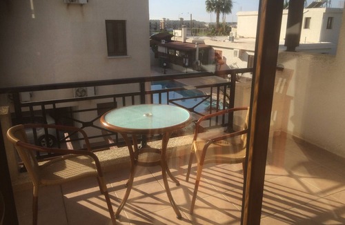 Paphos Apartment | Fabulous Roof Terrace near Tombs of the Kings on small complex with pool