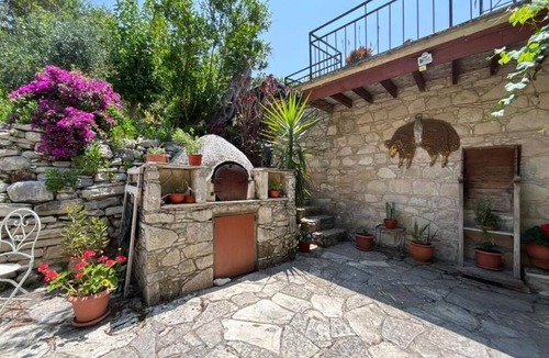 Lemona Cottage | Lantana Stone House. Where the wild thyme scents the stone.