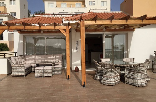 Peyia Town Apartment | Large Terrace, Sea Views, Shared Pool, Free WiFi, UK TV Package, Air Con, Lift