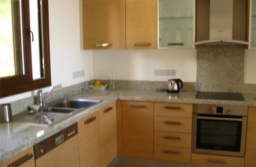 Peyia Town Apartment | Luxurious, top floor apartment with infinity pool. and stunning panoramic views