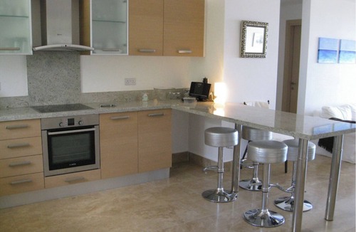 Peyia Town Apartment | Luxurious, top floor apartment with infinity pool. and stunning panoramic views