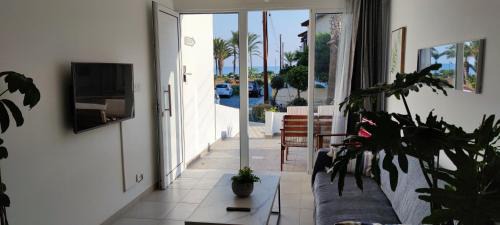 Latsi Apartment | Mediterranean Seaside Authentic Beach House