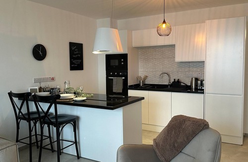 Karaagaรง Apartment | Penthouse on the waterfront with beautiful sea and mountain views. Deja Blue Wellness Resort