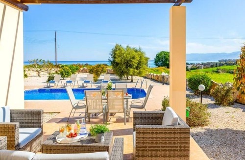 Latchi Villa | R 5002 Villa Andreas with Dining Facilities,Comfortable Seating & Dishwasher.