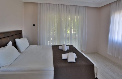 Karavas Villa | Riverside Coastal Retreat