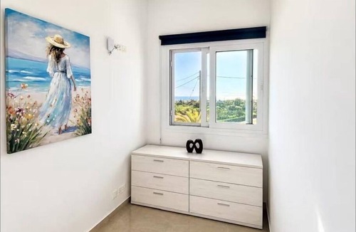 Agios Georgios Pegeias House | Spacious 4-bedroom house in tranquil Pegeia , with spectacular sea/mountain view