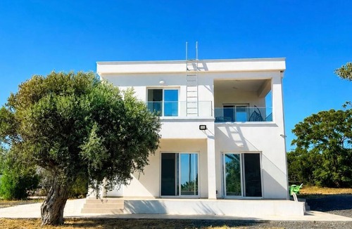 Agios Georgios Pegeias House | Spacious 4-bedroom house in tranquil Pegeia , with spectacular sea/mountain view