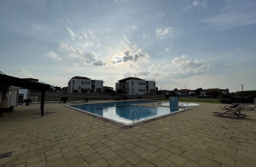 Tatlisu Apartment | Sunny Cypriot Apartment W/Site Pool, Gym and Kids playing area!