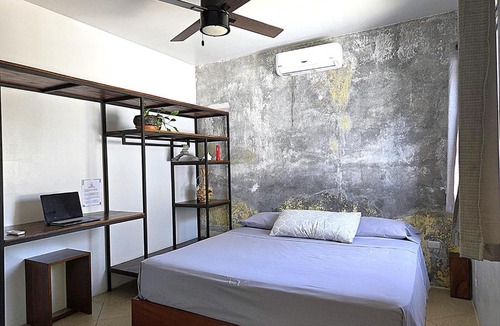 Las Pampas Apartment | The Stone Elephant - A place to relax in town with Hot Water and a Pool