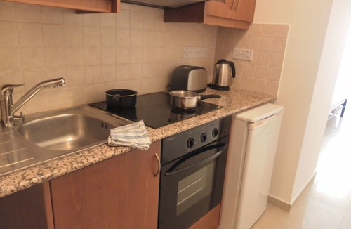 Peyia Town Apartment | Wonderful studio with double bed, kitchen & shower room, sunny balcony