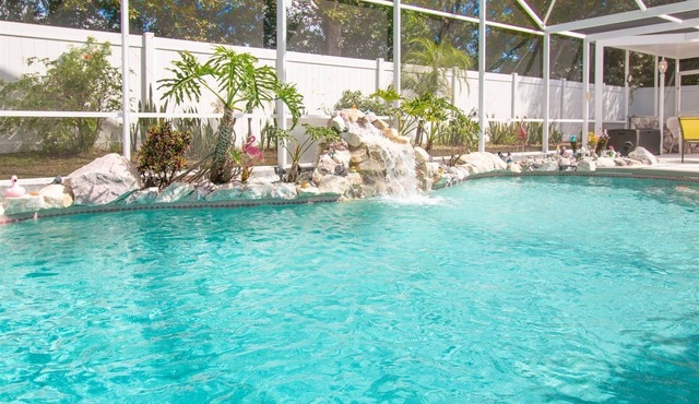 3 Bedroom Home with Private Screened Pool with Rock Waterfall Feature and Gameroom by Florida Dream. in Kissimmee