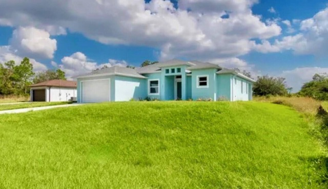 Azure Oasis House in Lehigh Acres