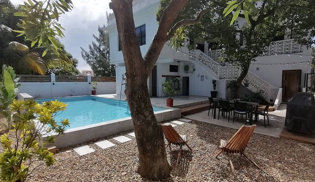 Downtown Dangriga. Entire property. Private pool. Sleeps 20. Handicap Accessible in Dangriga