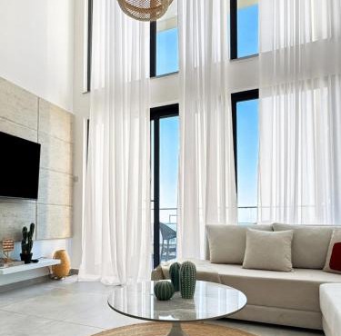ELLI Azure Loft & 2-Floor Boho Duplex with Rooftop Terrace & Infinity View